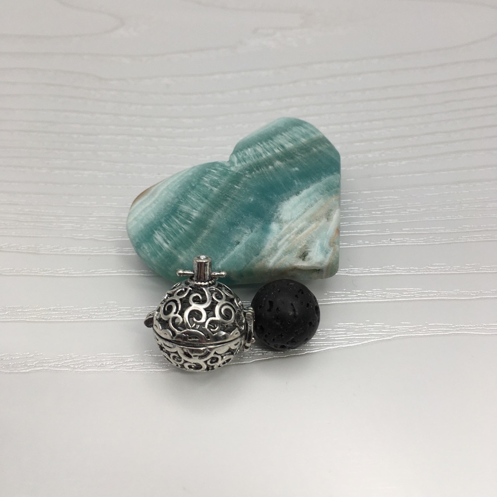 Swirl Pattern Aromatherapy Silver tone Locket.  Lava stone included.